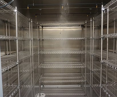 A metal shelves in a refrigerator